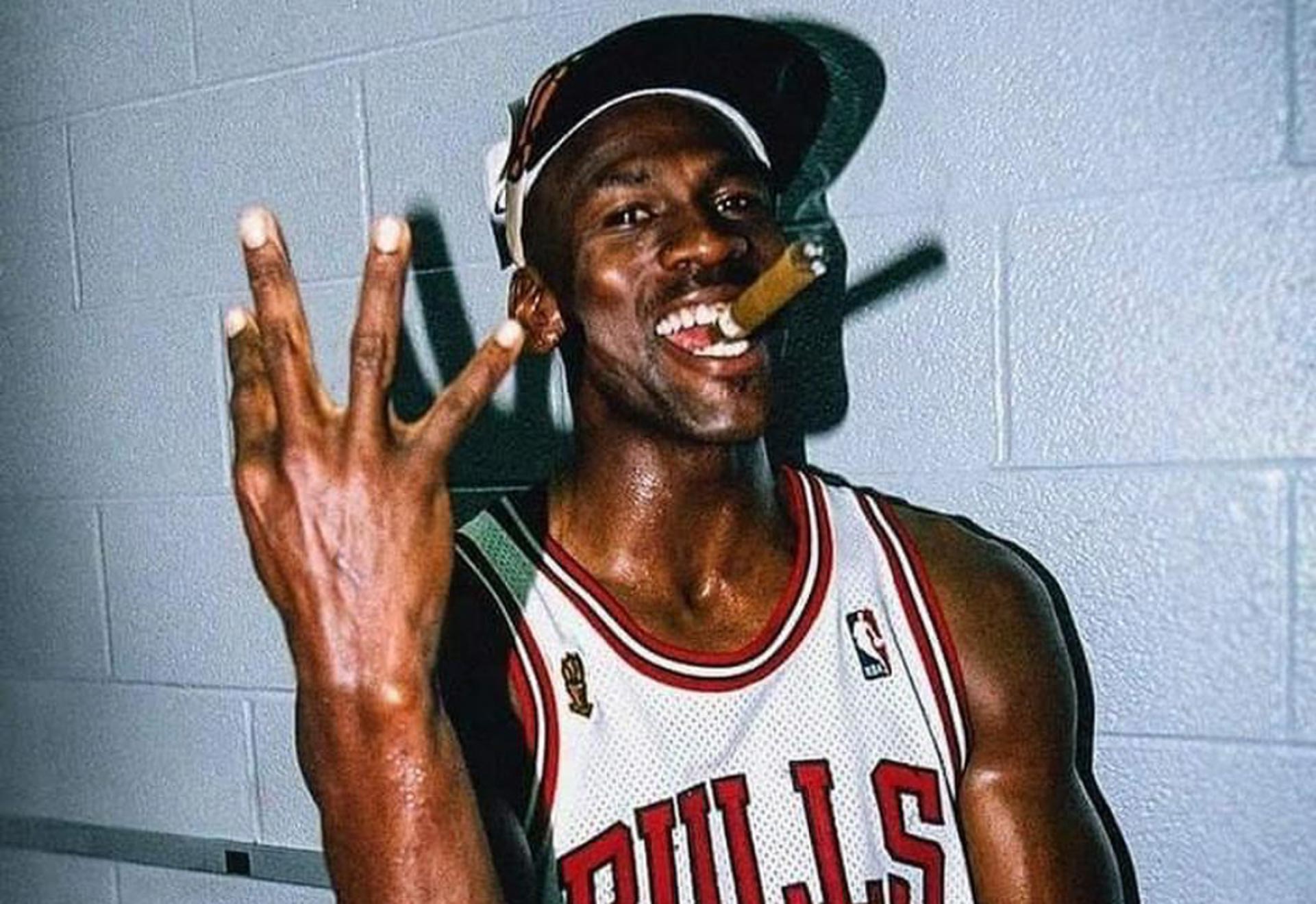 michael jordan holding up four fingers